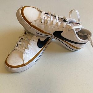 Women’s Nike Court next nature Legacy sneakers.